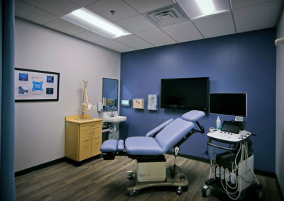 Examination room at Interventional Orthopedic Solutions Rochester
